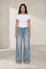 Jean bleu taille mi-haute coupe ample