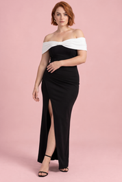 Robe longue noire et blanche style Bardot, nœud et fente haute | Porté sur une silhouette plus ronde | Lounelle Paris