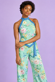 Combishort asymétrique vert menthe à imprimé floral et encolure dos nu | Vue rapprochée | Lounelle Paris