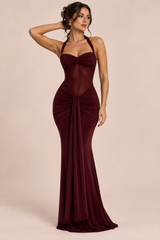 Long burgundy fitted dress with halter neckline and ruching